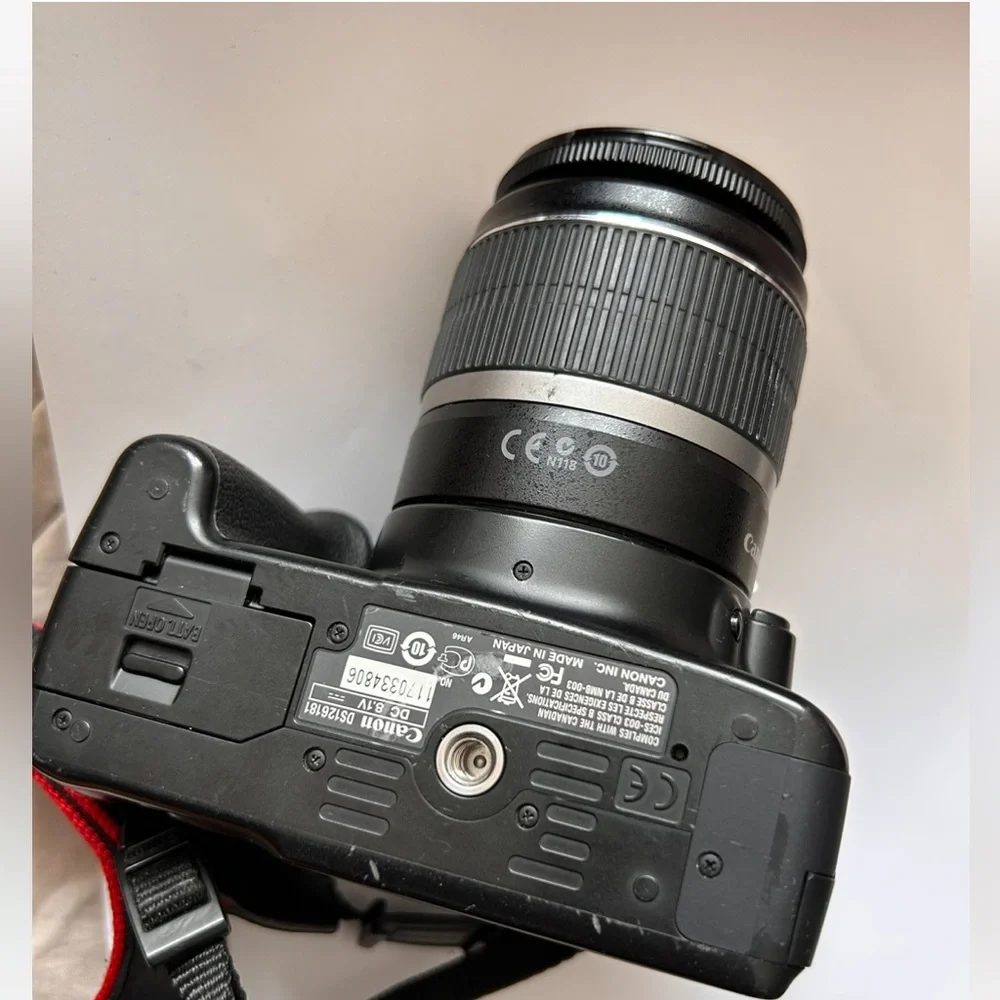 Canon EOS Rebel sxi Camera comes with only as shown in photos